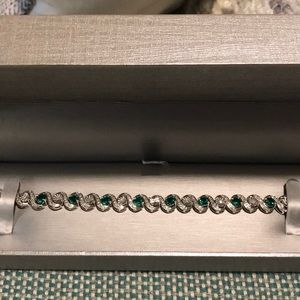 Emerald and diamond tennis bracelet